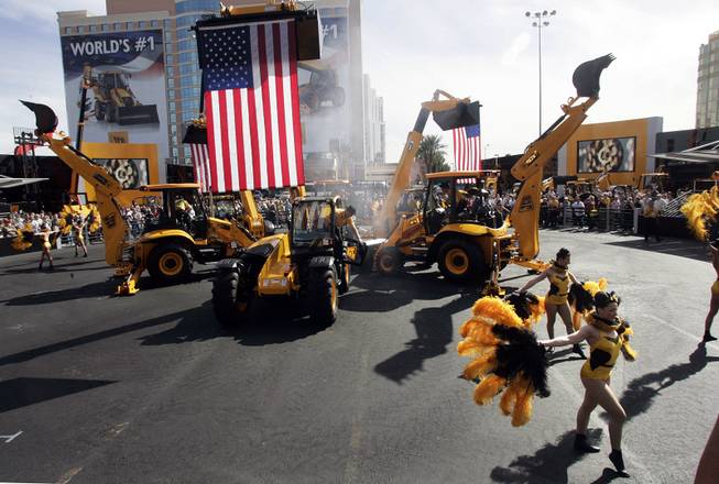 The Dancing Diggers perform Tuesday at the sprawling ConExpo convention outside the Las Vegas Convention Center.