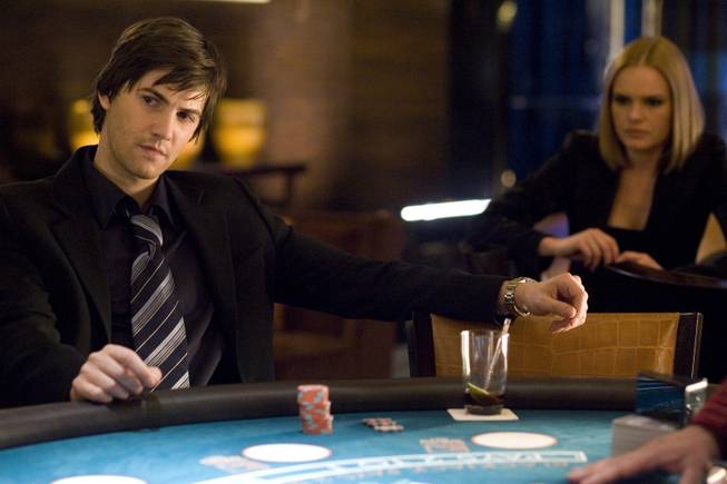 Ben Campbell (Jim Sturgess, left) is recruited by Jill Taylor (Kate Bosworth, right) to join M.I.T.'s blackjack team -- a group of students that uses smarts and skills to take Vegas for millions -- in Columbia Pictures' 21.