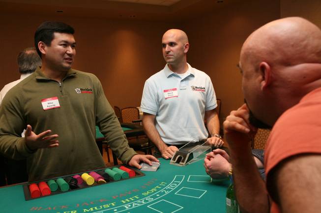 Two former members of the MIT blackjack team that won millions from Las Vegas casinos in the 1990s, Mike Aponte, left, and David Irvine, conducted a seminar on card counting at the Platinum Hotel in February 2007.