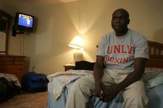  Joseph Kiwanuka sits in an extended-stay hotel room in December. The former fighter had been diagnosed with 