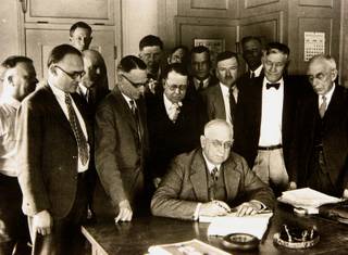 Henry Jo Kaiser signs a contract on March 11, 1931 for the federal government to start building the Hoover Dam with the help of contractor Six Companies Inc. Six Companies Inc. was a joint venture between Bechtel Corporation, Kaiser Industries, and several smaller construction companies across the West. The project started on April 20, 1931 and finished on March 1, 1936. It cost $49 million and is the second highest dam in the country.
