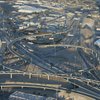 A view of the Spaghetti Bowl interchange taken from a KLAS-TV helicopter in 2006. The Spaghetti Bowl is where State Route 564, I-215, I-515, U.S Route 93 and U.S Route 95 converge. Las Vegas' record growth and the ensuing traffic problems created the necessity for interchanges and bypasses like the Spaghetti Bowl.