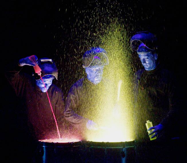 Members of Blue Man Group perform at the Luxor on Monday, April 21, 2003, in preparation of the release of their album "The Complex" on April 22.