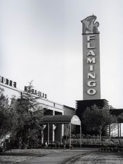 Benjamin "Bugsy" Siegel's Flamingo Hotel is shown in this photo. Under Siegel's authority the hotel's construction was disorganized and the grand opening was a flop, forcing the hotel to close after less than a month of operation. Siegel's mismanagement of the Flamingo eventually cost him his life. 