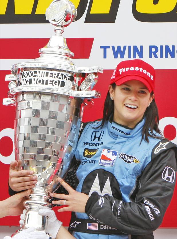Danica Patrick of Andretti Green Racing shows off her trophy ...