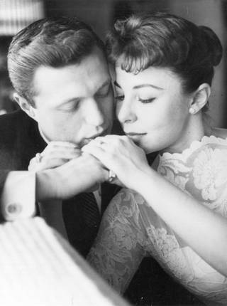 Performers Steve Lawrence and Eydie Gorme share an intimate moment at their Las Vegas wedding, 1957. The duo were famous for their 10-year run as headliners at Caesars Palace, as well as performances at the Sands and Desert Inn.
