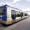 The new Metropolitan Area Express (MAX) rapid transit system vehicle hits the streets following an unveiling ceremony at 3258 North Las Vegas Boulevard on Wednesday, June 30, 2004. The vehicle, provided by the Regional Transportation Commission of Southern Nevada, offers commuters a new and larger form of public transportation. Each MAX vehicle can carry up to 120 passengers and uses a cutting-edge optical guidance system to precisely direct it near each MAX station. 