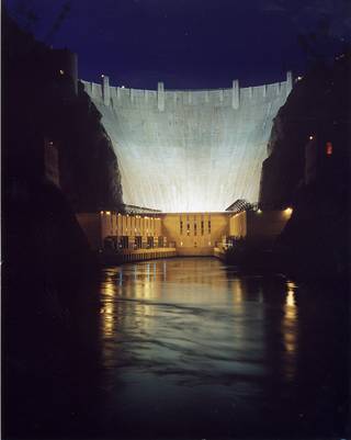 A tranquil view of Hoover Dam at night. Each year about 10 million people visit Hoover Dam. It's maintained by the U.S. Bureau of Reclamation and became a National Historic Landmark in 1985.