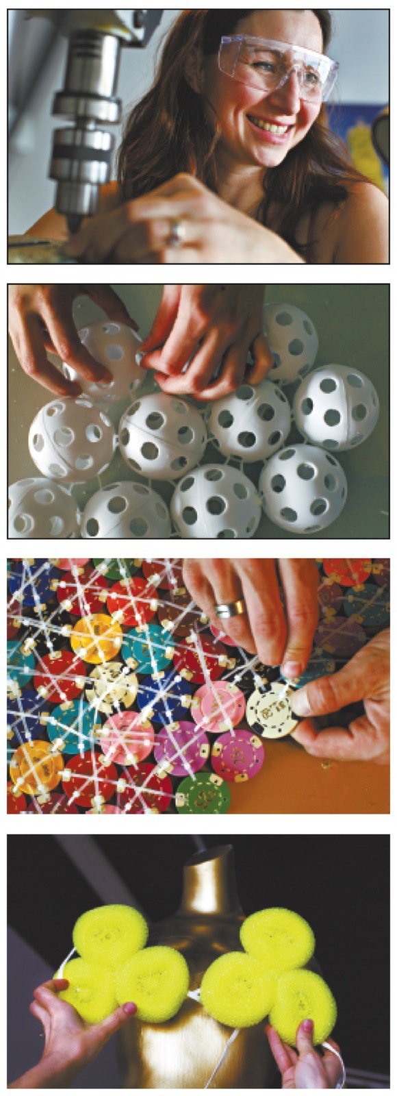 Barcus-Slonina, top, works on her installation 