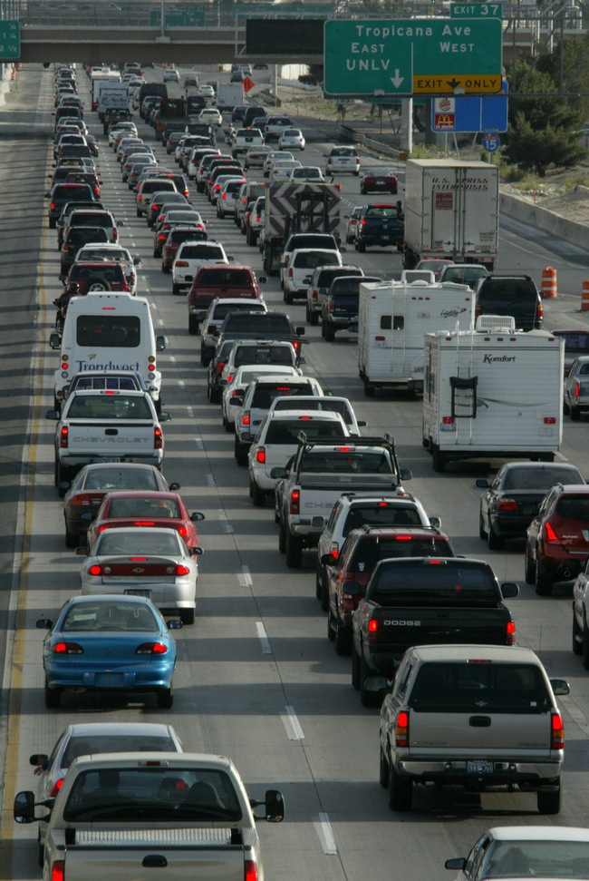 Motorists navigate rush hour traffic on Interstate 15 in Clark County. Rep. Jon Porter, who opposed tougher fuel efficiency standards two years ago, more recently has taken the position that Congress should act against global warming.