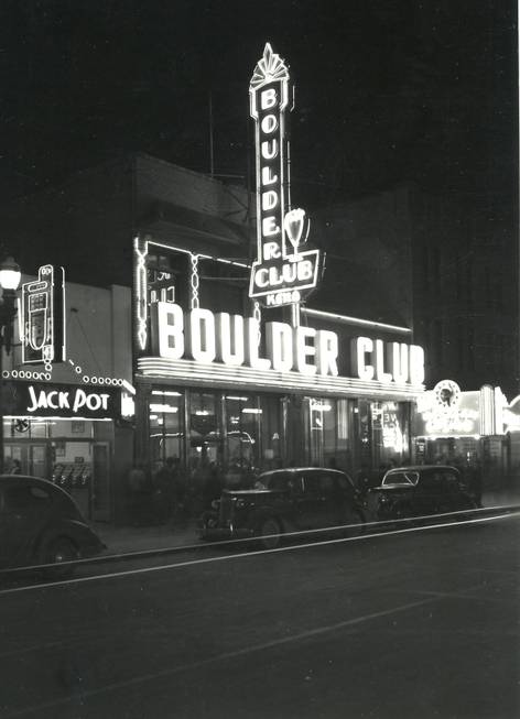 The lights of the Boulder club light up the night, ...