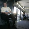 Roger Buehrer catches up on reading during the time he spends on the bus to and from his job at the Las Vegas Valley Water District. "I hate driving in traffic so it's a wonderful way to get to work," said Buehrer, 61. He figures he saves $70 a month by not buying gasoline to commute.