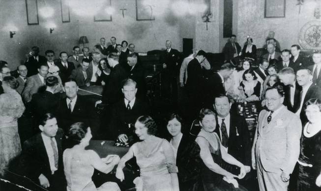 Tony Cornero sits far left at The Meadows Casino. The owner of the Stardust Hotel and Casino, dropped dead on July 31, 1955 while shooting craps at the Desert Inn.