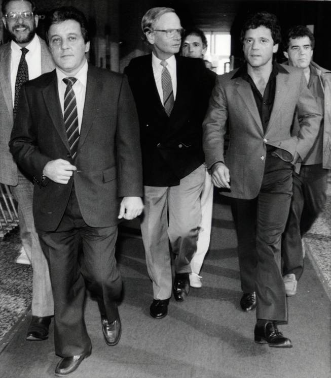 Mobster Anthony Spilotro, left, and his brother, Michael, leave the federal building in Chicago after a bond hearing in 1986. In June of that year the bodies of the Spilotro brothers were found buried in an Indiana cornfield. Sand inside of the lungs of the bodies lead investigators to conclude that the pair had been buried alive.