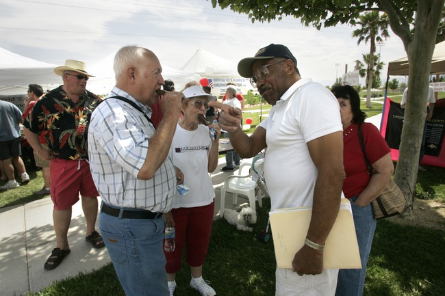 Bill and Nola Asher, left, eat ice cream and chat with Rod and Joan Smalls during the social. Residents say the campaign was a bonding experience.