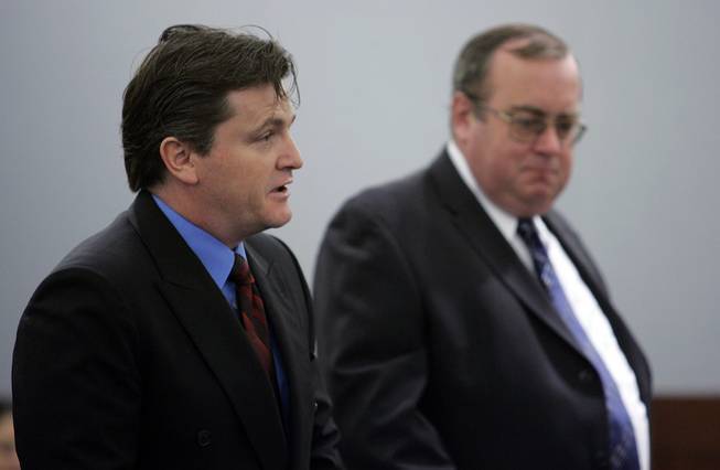 REI Neon attorney Paul Larsen, left, and Las Vegas City Attorney Phil Byrnes appear in District Court on Thursday for a hearing in a lawsuit challenging the company's plans to build an arena downtown. A status hearing was scheduled for Oct. 2.