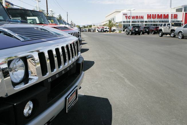 The lots are full of vehicles at Towbin Hummer on Sahara, where the economy model gets 13 mpg.
