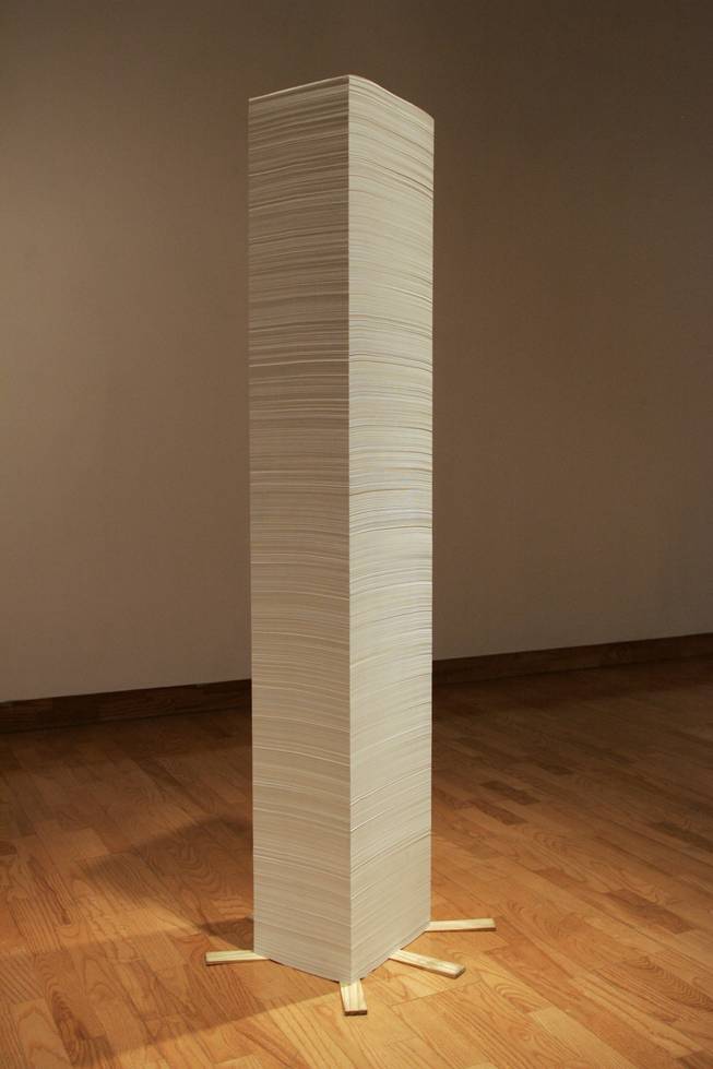 Sommerhauser's 300-pound, 8 1/2-by-11-inch paper tower in his exhibit at the Donna Beam gallery has fallen twice.