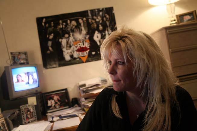 Sally Steele puts the finishing touches on the July issue of Vegas Rocks! magazine in her home office.