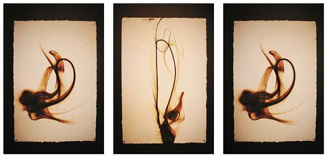 Etsuko Ichikawa creates his pyrographs by using molten glass to burn abstract forms onto paper. The Seattle artist studied at the city's Pilchuck Glass School. At Dust Gallery, 900 Las Vegas Blvd. South, Ichikawa's works are augmented by a painted brown wall that divides the gallery.