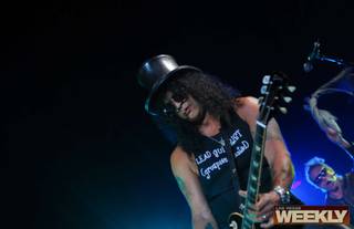 Slash performs at his 43rd birthday celebration Wednesday at the Bare Pool.