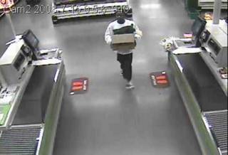 Surveillance video image of the robbery suspect.