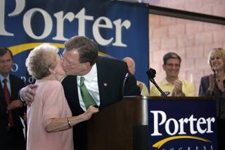 Congressman Jon Porter, R-Nev., gives a kiss to his mother Bette as he kicks off his re-election campaign at the Nevada State College in Henderson on Wednesday. 