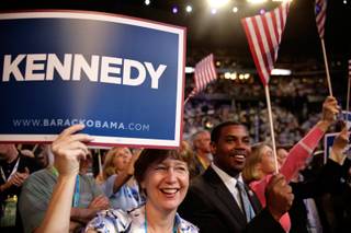 State Assembly Speaker Barbara Buckley, from left, and State Senator Steven Horsford cheer for Caroline Kennedy as she speaks inside the Pepsi Center during the first day of the Democratic National Convention in Denver. 