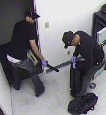 Police are searching for these two men who robbed a cash loan business July 25 near the 1600 block of East Flamingo Road in Las Vegas.