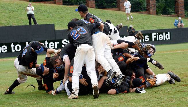 Bishop Gorman's American Legion affiliate, the Southern Nevada Titans, closed the summer on a 21-game winning streak, including a 5-1 triumph against Pasco, Wash., today in the championship game of the American Legion World Series at Keeter Stadium in Shelby, N.C.