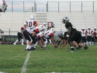 The Palo Verde defense lines up against Reno High School during Reno's first possession of the game. The Panthers' defense kept Reno from scoring a single point.