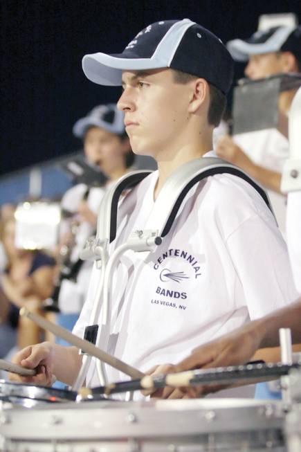 centenial-marching-band-michael-raye-plays-the-drums-for-the