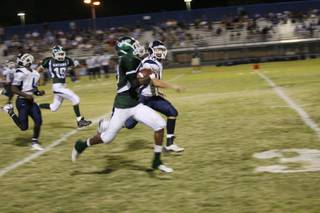 Green Valley wide receiver Derrick Stevens runs for a touchdown during a home game against Centennial on Friday night. 