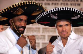 Lightweight boxers Joel Casamayor, left, of Cuba and Juan Manuel Marquez of Mexico pose during a news conference at the MGM Grand hotel-casino in Las Vegas on September 10, 2008. The boxers meet for a 12-round fight at the MGM Grand Garden Arena on Saturday.
