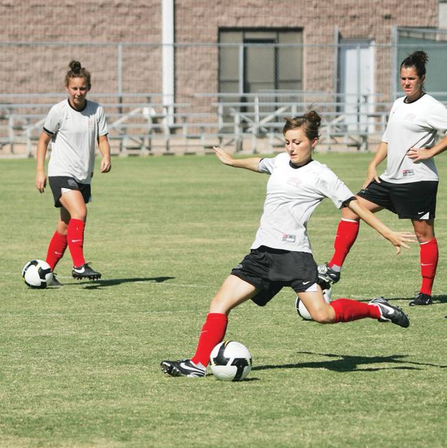 Green Valley High graduate Hailey Garrison, who now plays for the UNLV women's soccer team, kicks a ball during practice at the Peter Johann Memorial Soccer Field.