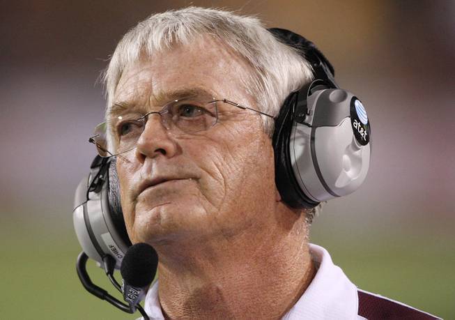 Arizona State head coach Dennis Erickson looks up at the scoreboard in a game against UNLV in 2008.