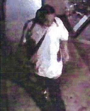 Police released this security camera photo of a man who robbed -- with two other men -- four victims at 2:37 a.m. Saturday in the 1800 block of east Charleston. Police said the man was wearing a white T-shirt and dark jeans with white down the back of the pants. He is considered armed and dangerous, police said. 