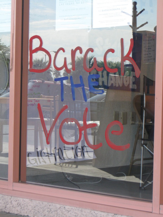 Window paintings and signs such as this one decorate the front of the Obama Campaign for Change's North Las Vegas field office.  