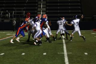 Sophomore quarterback Chase Roberts passes to a Durango teammate during Friday's game at Bishop Gorman.