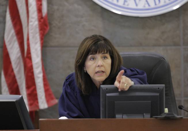 Judge Jackie Glass gestures during O.J. Simpson's trial Tuesday, Sept. 23, 2008, in Las Vegas. Simpson faces 12 charges, including felony kidnapping, armed robbery and conspiracy.