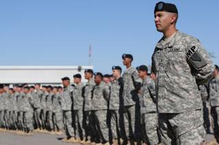 The Nevada Army Guard's 72nd Military Police Company stands at attention during their farewell ceremony as they prepare to deploy on their second mission to Iraq Nov. 10, 2007.