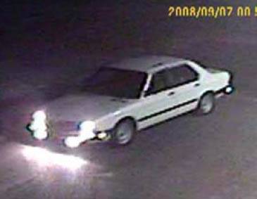 A BMW suspected of being used in the business robbery. 