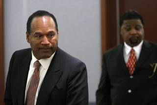 O.J. Simpson, left, and co-defendant Clarence 