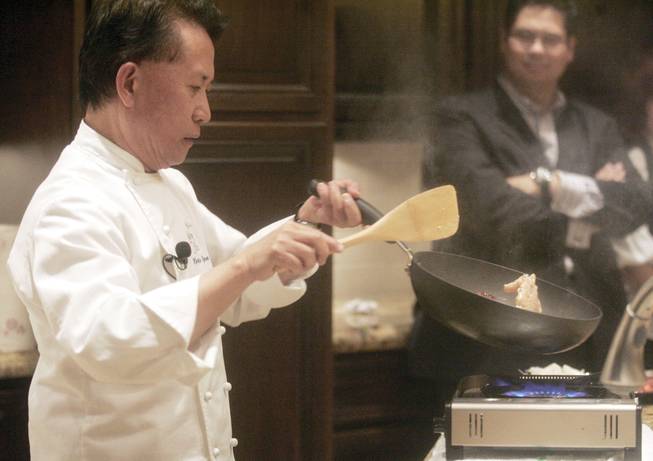 Award-winning chef Martin Yan, whose television show "Yan Can Cook" aired on PBS for 26 years, gave a cooking demonstration to promote his new restaurant, 9 Dragons, which will open at Tivoli Village.