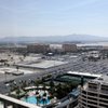 
Harrah's originally intended to its contribution to a sports arena project to be this land behind Bally's and Paris. It's now talking about sharing costs.