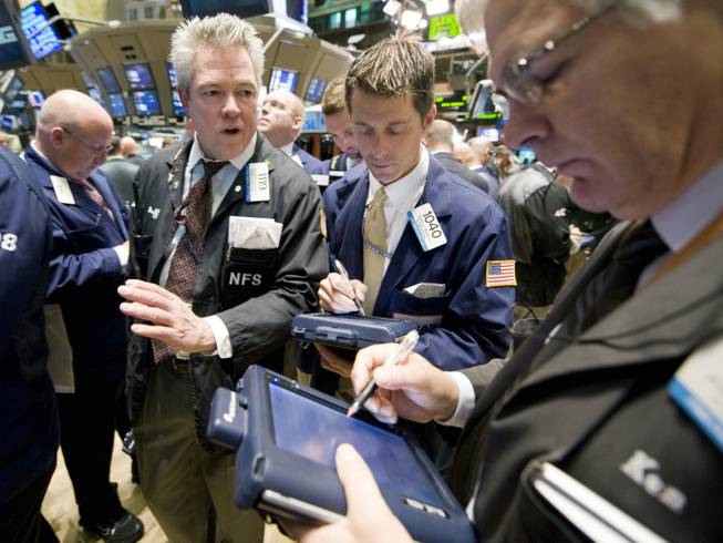 Traders work on the floor of the New York Stock Exchange, Tuesday Sept. 30, 2008. Stocks staged a partial rebound early Tuesday after their biggest sell-off in years, though financial markets remained troubled a day after lawmakers rejected a $700 billion rescue plan for the financial sector. 