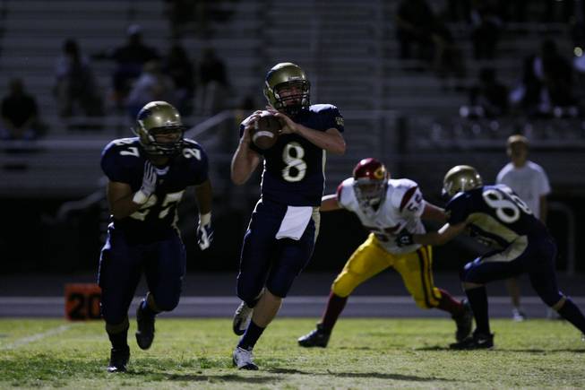 Foothill's Aaron Dupin (8) runs with the ball during Friday's game against Del Sol. The Dragons won, 40-17.