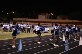 Canyon Springs cheerleaders excite the crowd at Friday's game against Green Valley.