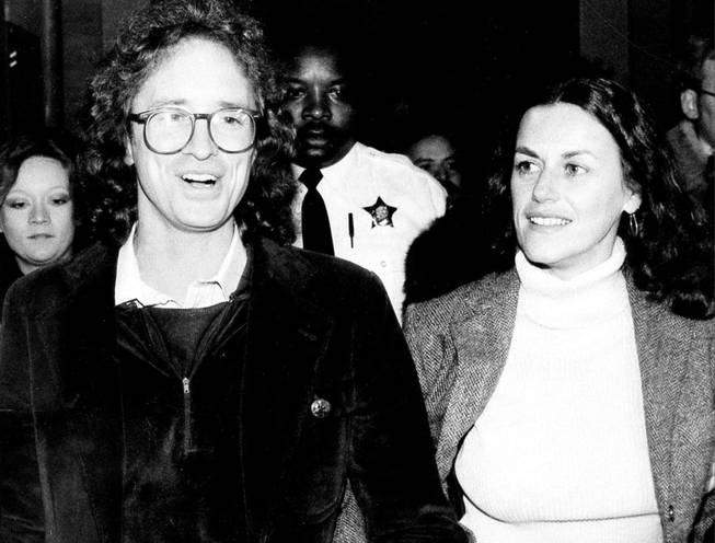 
William Ayers accompanies Bernardine Dohrn as the former radical enters the Criminal Courts Building in Chicago in 1980 to surrender to authorities.