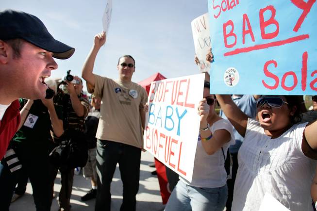 Ross Crane, left, a John McCain supporter from Las Vegas, confronts Barack Obama supporters as they demonstrate outside the Sarah Palin rally at the Henderson Pavilion in Henderson Tuesday.